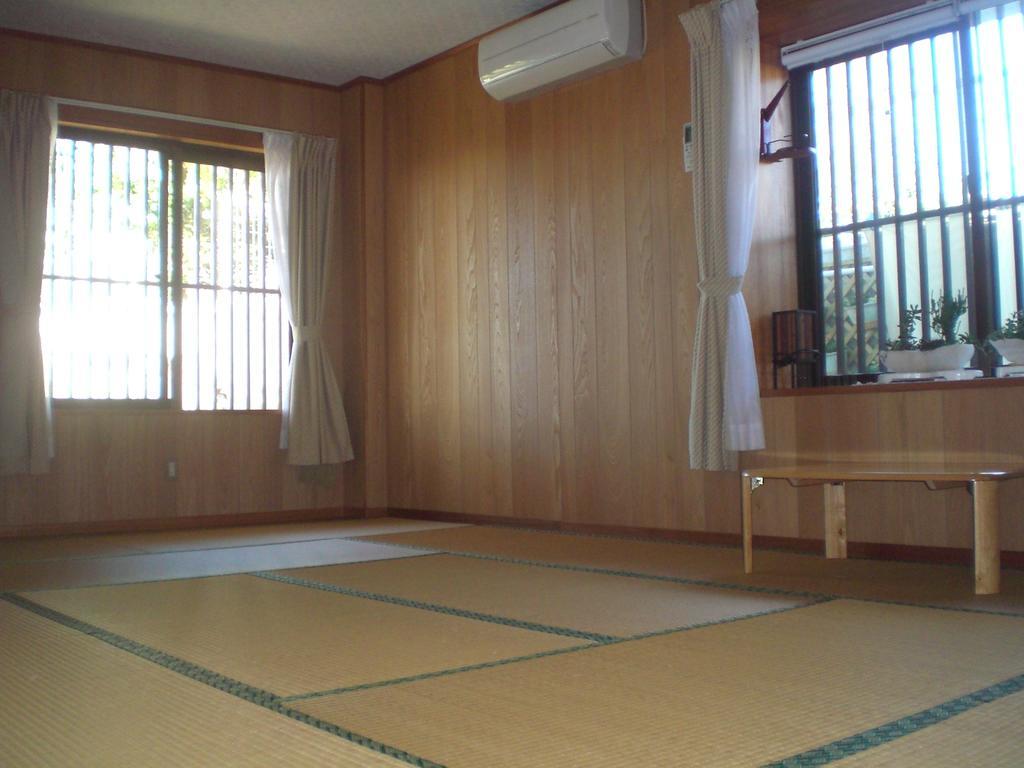 Minshuku Shizu Hotel Onna Ruang foto