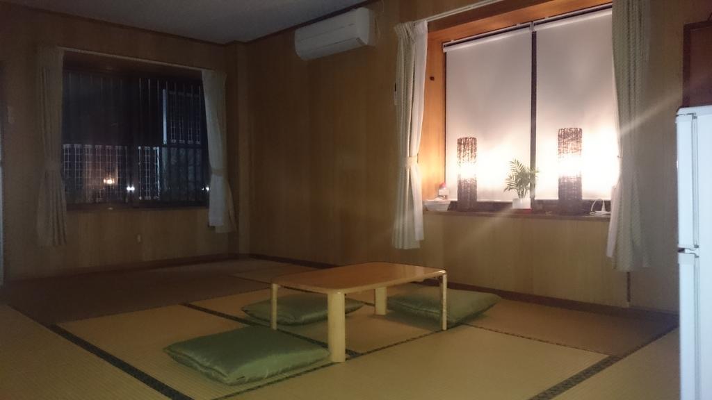 Minshuku Shizu Hotel Onna Bagian luar foto